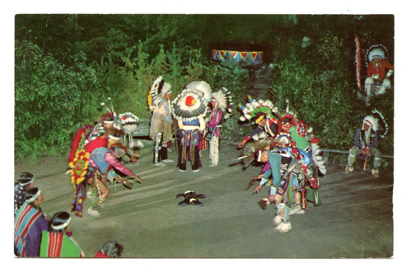 The Dog Feast Dance of the Sioux at the Stand Rock Indian Ceremonial, Wisconsin Dells, WI [Postcard]