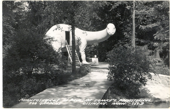 Brontosaurus in Paul Ora Domke's Prehistorical Zoo Gardens, Ossineke, MI - Carey's Emporium
