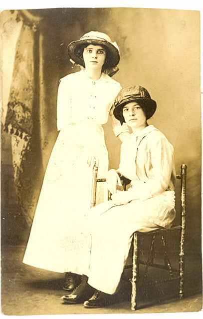 Two Ladies Posing - Carey's Emporium