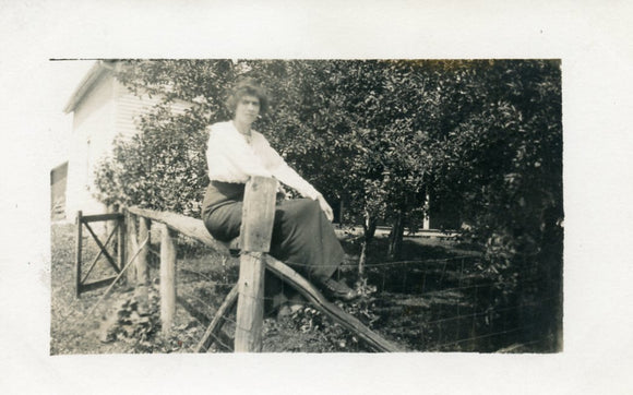 Lady Sitting on Fence - Carey's Emporium