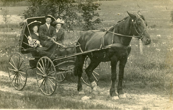 Family out for a Ride, River Falls, WI - Carey's Emporium