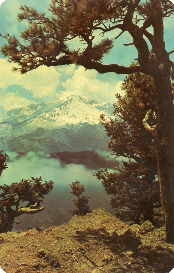 Clouds around Pikes Peak as seen from top of Rampart Range road in the Pikes Peak Region, CO - Carey's Emporium