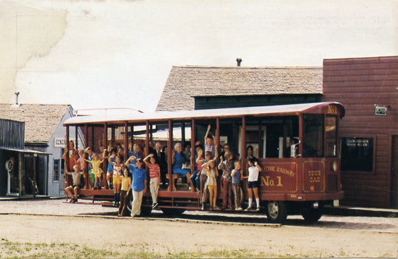 Old No. 1, a Replica of Early-day Street Cars that Roamed The Richest Hill on Earth Takes Visitors to Historic Spots, at Butte, MT-Carey's Emporium