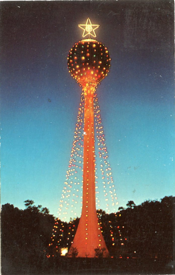 Each Christmas Season the city of New Smyrna Beach, FL, Decorates its 165 Ft. Water Tower-Carey's Emporium