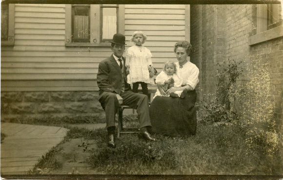 Family in Front of Their House-Carey's Emporium
